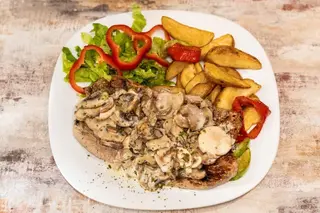 Teleća šnicla u šampinjon sosu 200 gr