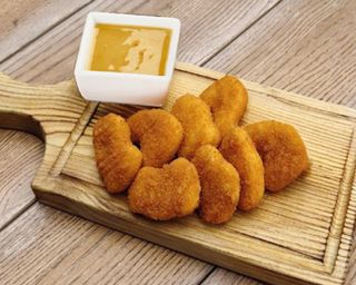 Курячі нагетси з гірчичним соусом (200/100г)