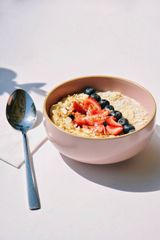 Oatmeal with soy milk, fruit, banana, granola