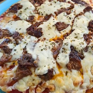 Pizza Cabrito Individual