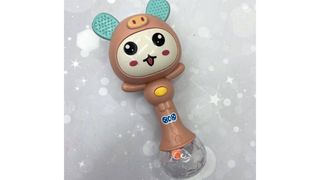 Музыкальная погремушка с прорезывателем