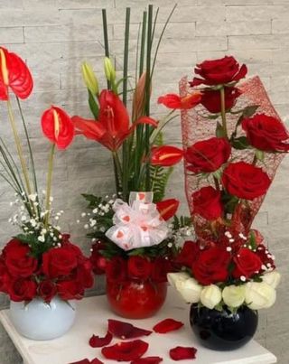 Vase de Roses Rouges