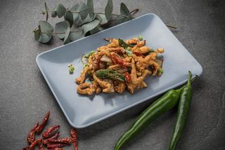 S41 Calamari piccanti fritti saltati con cipolla, peperoncino