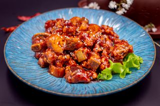 Spuntature di maiale con salsa agrodolce/糖醋排骨