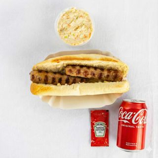 Хот-дог кебапче и сос + салата по избор  + Кока Кола Кен