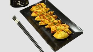 Fried salmon gyoza