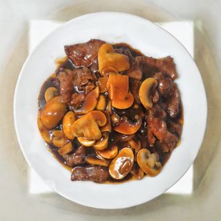 ternera con champiñones