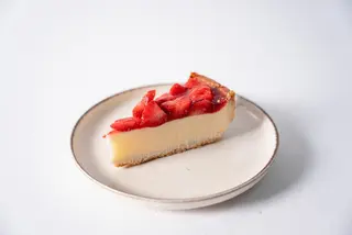 Porción Cheesecake con fresas