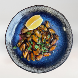 Мідії в устричному соусі (150гр)