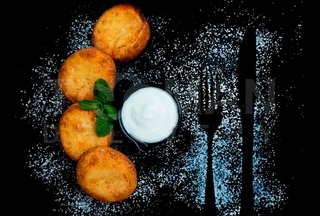 Сирники зі сметаною