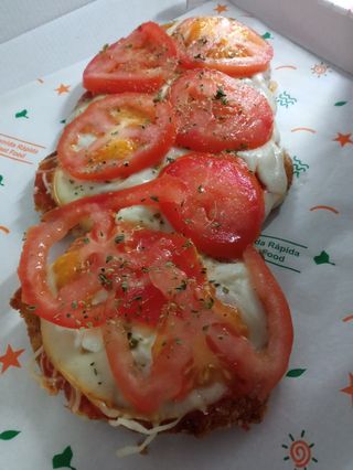 Milanesa Napolitana de ternera con tomate a rodaja