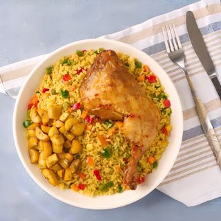 Fried rice and salad with goat meat