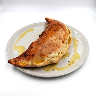 PIZZE CALZONE PROSCIUTTO E FUNGHI