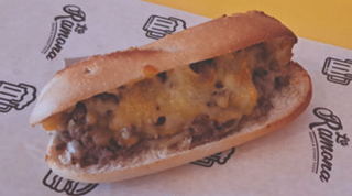 Ramoncito de picada con salsa cheddar y dulce de bacon