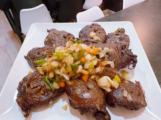 Cabeza De Pato A La Pimienta Y Sal 