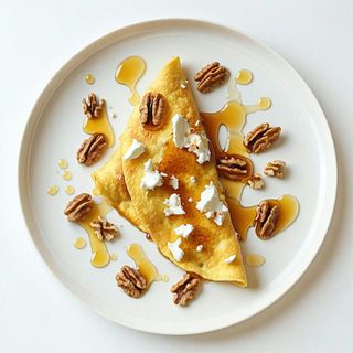 Omlet z kozim serem miodem i włoskimi orzechami