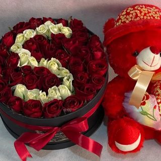 Box de fleurs avec nounours