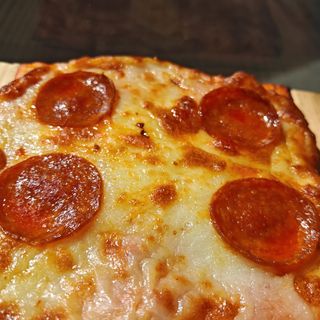 Pizza Peperoni (Porción)