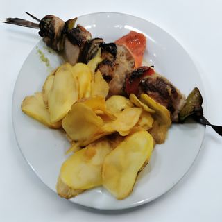 Brocheta de pollo al carbón