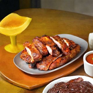 Pečeno svinjsko meso  u mangalu 0.500gr + PRILOG POMFRIT