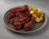 Costițe de porc la grătar cu cartofi chilli