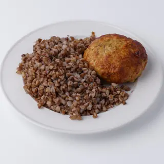 Гречана каша з маслом та куряча котлета із сиром (250г)