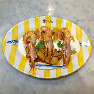 Mezzi paccheri con guanciale e gamberoni