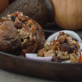Baked potato with  Pork with onions