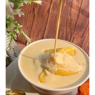 A Plate Of Custard With Milk & Sugar