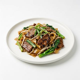 Pasta de arroz frito con cerdo