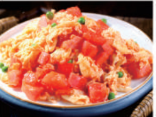 90 Uova saltata con pomodoro