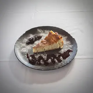 Tarta de queso con mermelada de arandanos