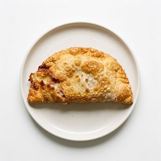 Pitone con prosciutto cotto e formaggio
