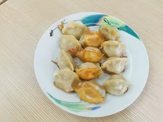122. Ravioli di maiale, gamberi ed erbe cinese - 10 pezzi