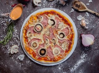 Pizza Prosciutto e funghi