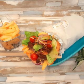 Porky Obsesión - Pita Gyro con lomo de cerdo macerado en la cerveza