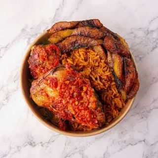 Jollof Rice with Fried Plantain & Peppered Chicken