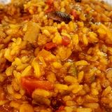 Arroz meloso con secreto ibérico y setas