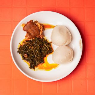 Efo Riro and Poundo with Goat Meat