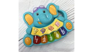 Музыкальная развивающая игрушка Слоник