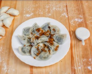 Pierogi z kapustą i pieczarkami