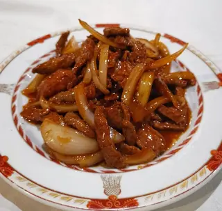 Ternera Con Cebolla