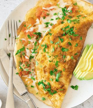 Omelette Poulet Champignon Fromage