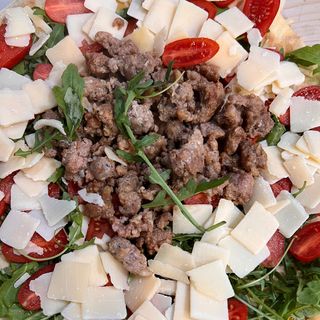 Purpuzza con pomodorini, rucola e grana