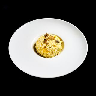 54 Riso saltato con verdure e tartufo 
