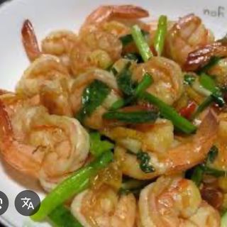 Gamberetti con zenzero e cipolla 