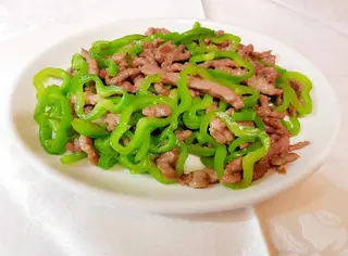 Ternera Con Pimientos Verdes