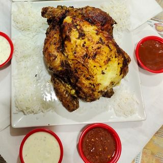 Pollo A L`Ast Entero (1 Ud.) Con Arroz Y Coca-Cola Sabor Botella 2L.