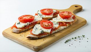Bruschetta Quatro Formaggi with fresh tomatoes