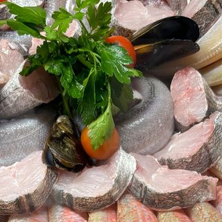 Merluza con salsa champiñon y arroz